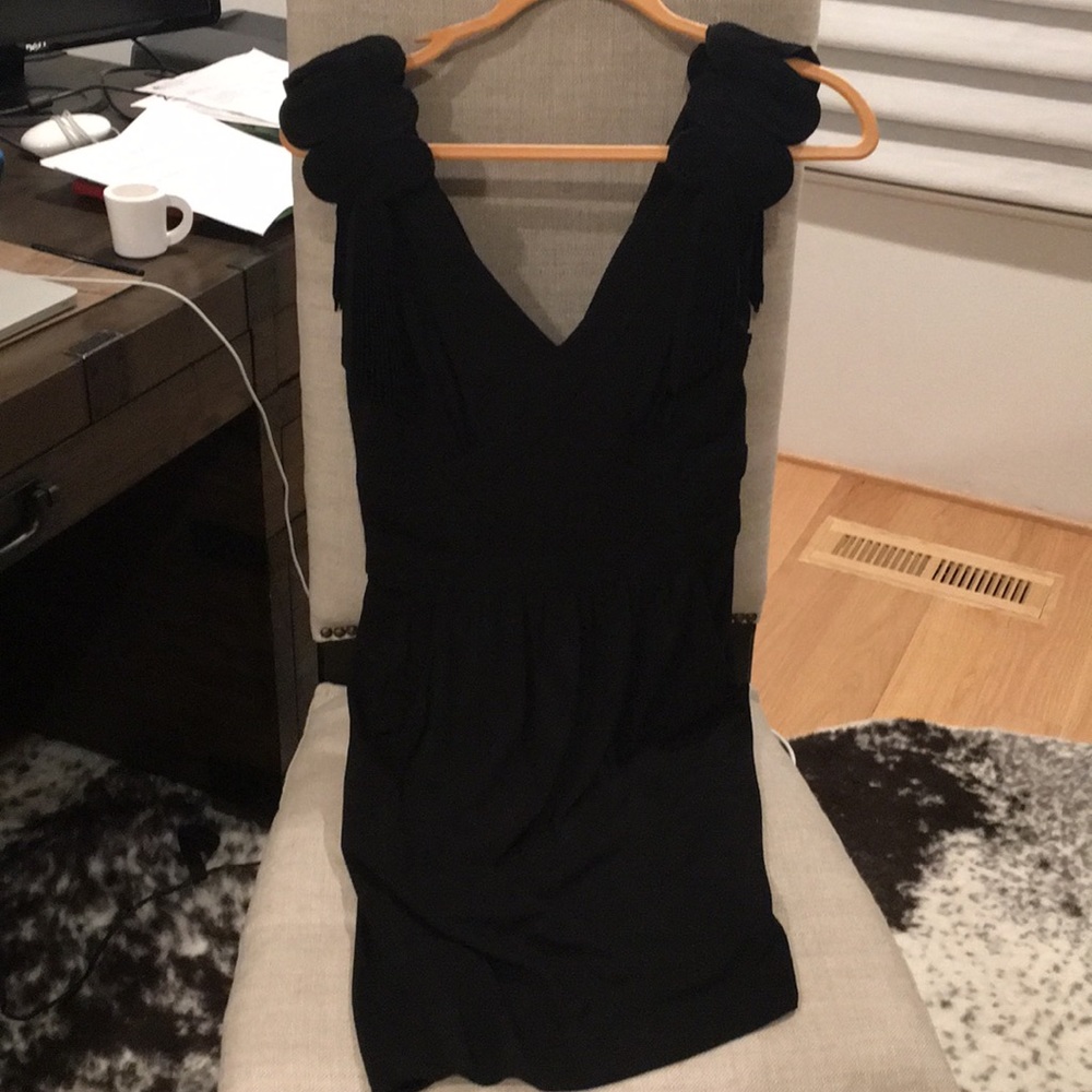 City chic, little black dress.